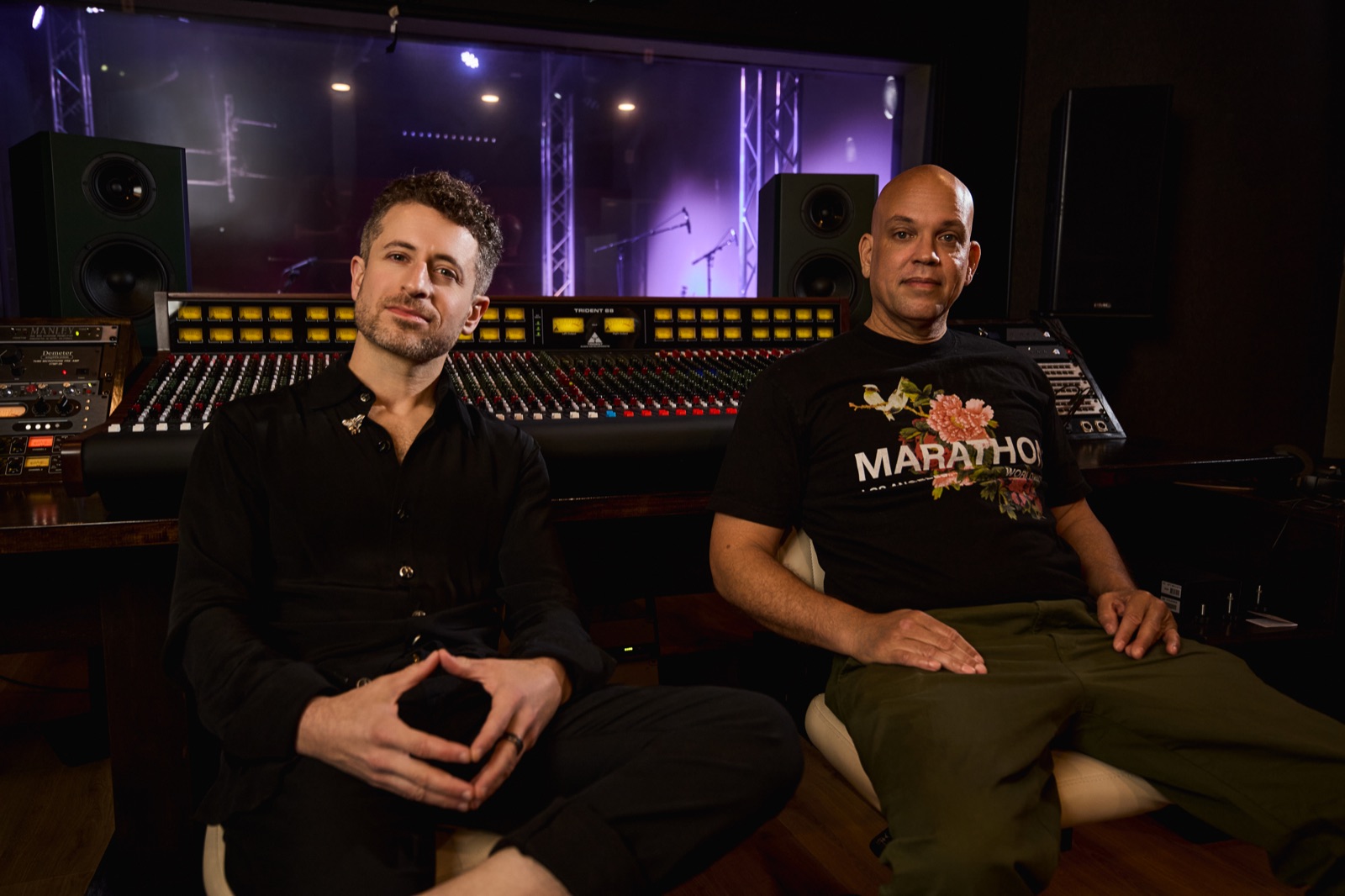 The Trident 88 console in the Mixing Room, faders lit
